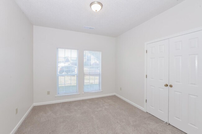 Building Photo - 6650 Spencer Forest Cove E