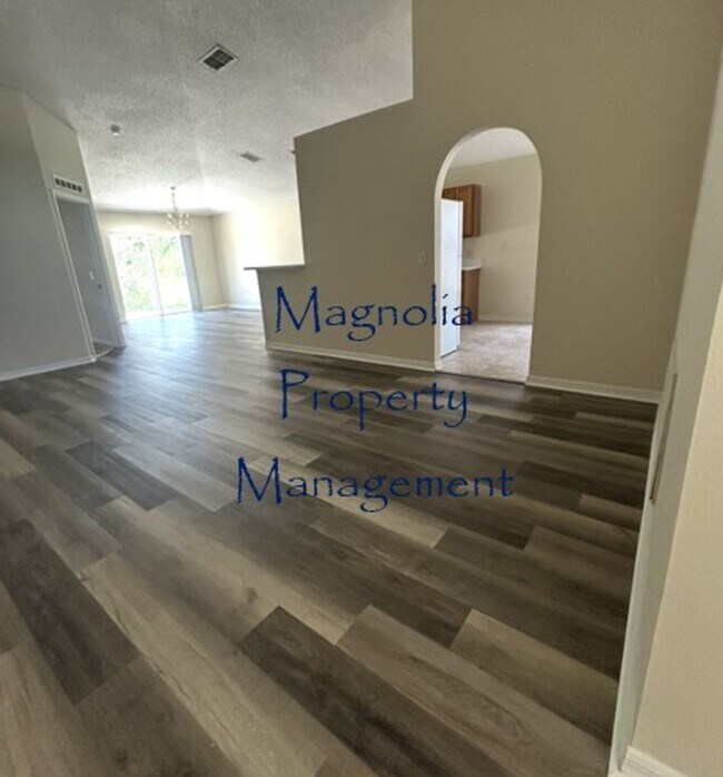 Building Photo - New Paint, Floors and Solid Surface Counte...