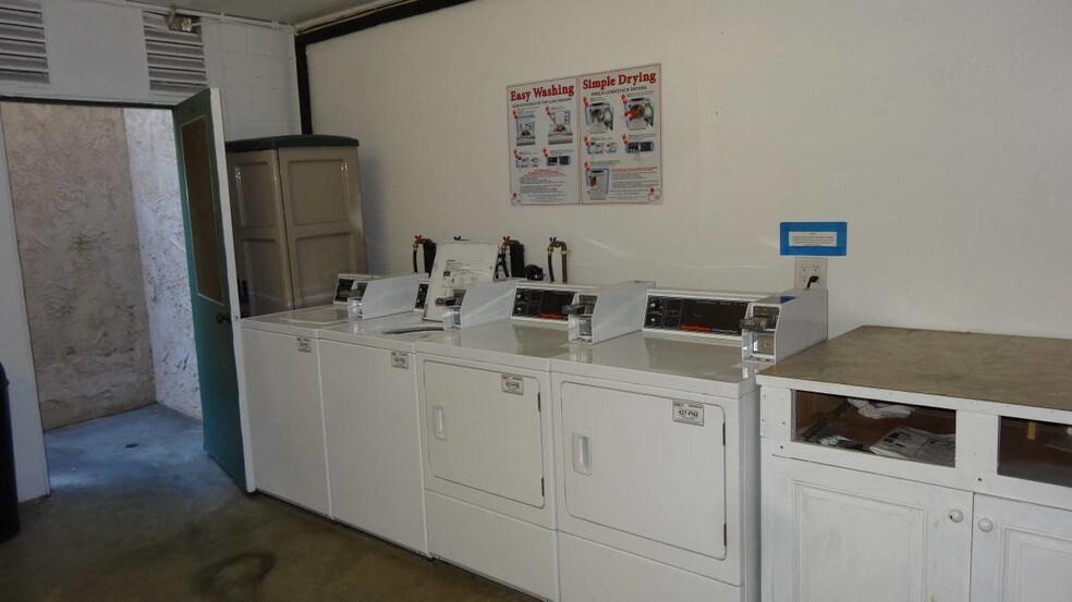 Washer, Dryer and Folder table - 12030 Rochester Ave