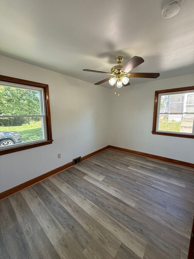 Building Photo - Charming 4-Bedroom Cape Cod Home with Spacious Yard & Storage