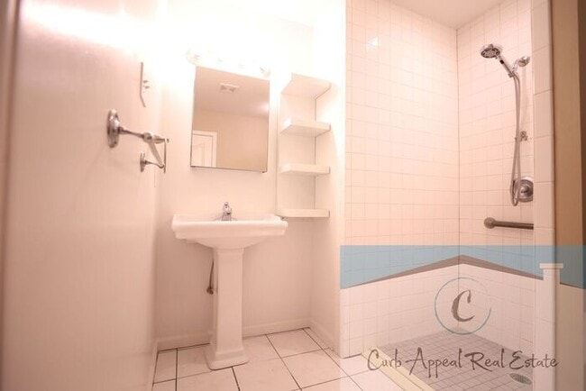 Building Photo - First month move in special $900!! Beautiful 3-bed, 2 bath condo with 2-car garage - includes was...