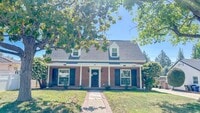 Building Photo - For rent! This charming 4-bedroom, 3-bathr...