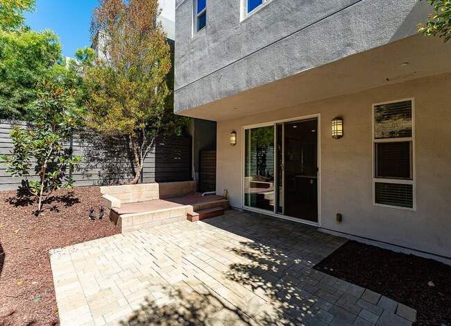 Building Photo - Tucked within the Hollywood Hills in a gated community