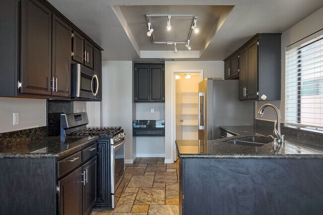 Building Photo - Modern Comfort with Pool & Spa in The Lakes – Solar Equipped Home