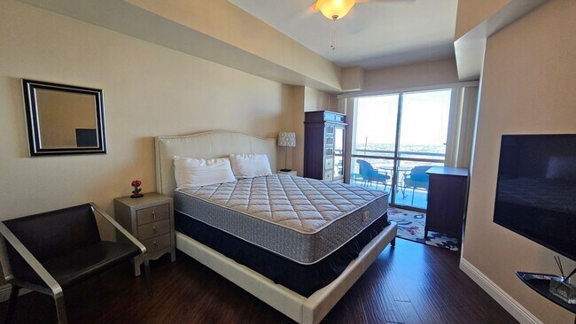 Building Photo - ***GORGEOUS FURNISHED 1 BEDROOM CONDO AT A...