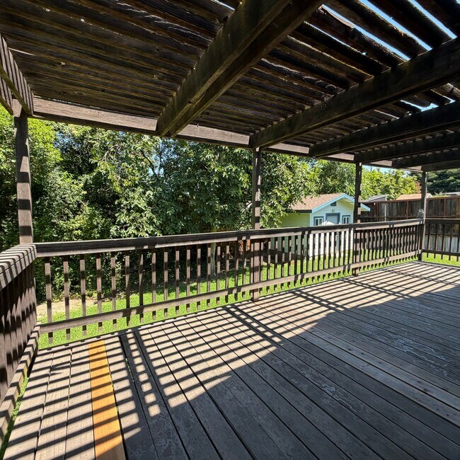 Building Photo - Adorable house with large deck,  yard and RV access