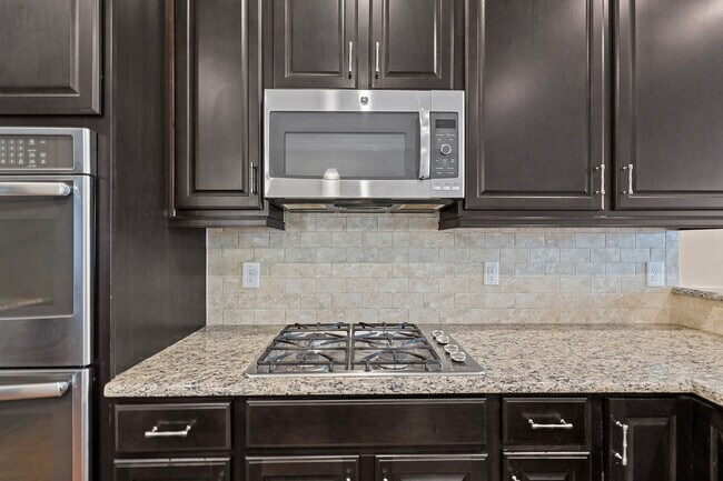 Building Photo - 4 Bedroom Home with Finished Flex Space Ab...