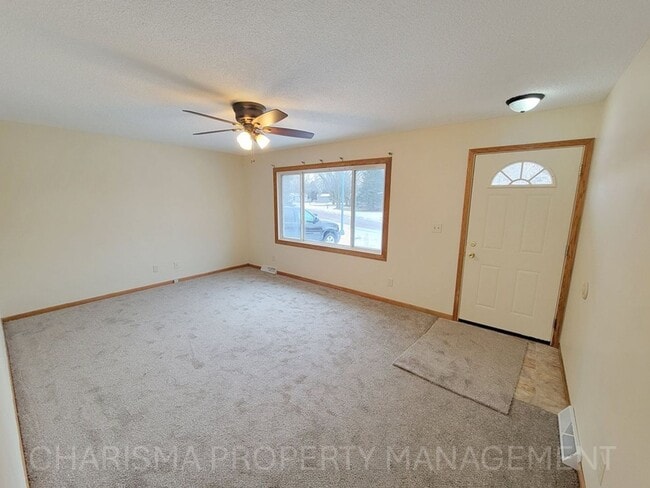 Building Photo - 4 BD, 2 BA - FENCED IN YARD, PRIVATE TRAILS, FINISHED UPPER AND LOWER LIVING AREAS, ATTACHED GARAGE!