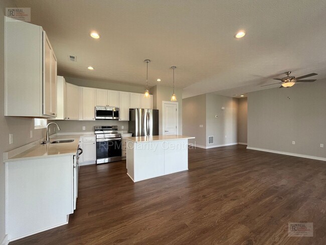 Building Photo - Beautiful 3BR Home with Pond Views, Modern Finishes & Low-Maintenance Living