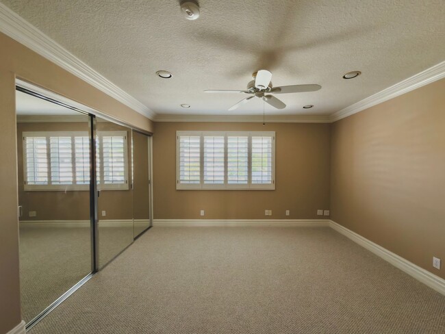 Building Photo - Elegant Mediterranean Living with Private Pergola Garden & Resort Amenities