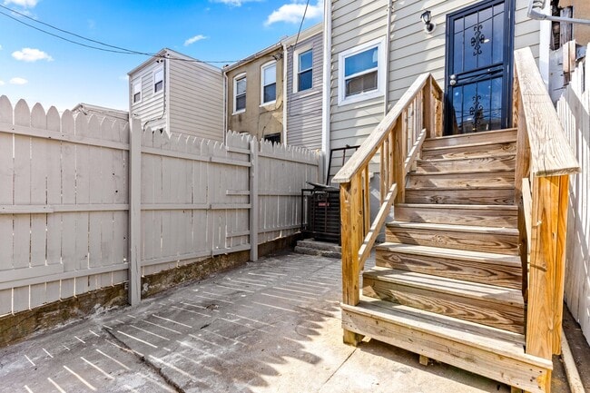 Building Photo - Parkside Haven: Contemporary 2-Bedroom Row Home Near Patterson Park