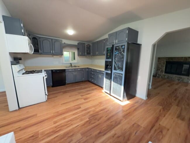 Building Photo - Welcome to your city retreat just minutes from downtown.