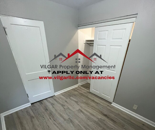 Building Photo - Step into comfort and security in this bea...