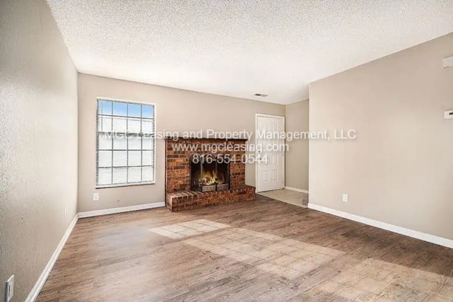 Building Photo - Millwood Townhomes - Move In and Choose Your Bonus: a Brand-New 55" TV or a $250 Amazon Gift Card...