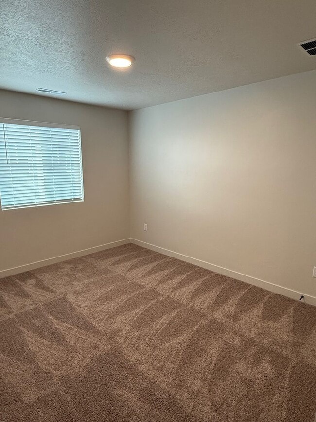 Building Photo - Beautiful townhome, construction just completed, 2 car garage, central air