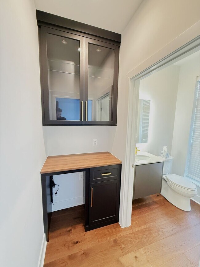 Building Photo - Brand new 4 level, 4 Bedroom Townhome with Elevator!