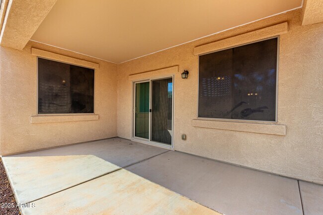 Building Photo - 9883 W Harmony Ln