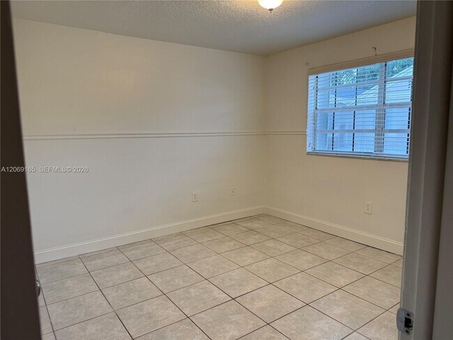 Building Photo - 12372 SW 52nd Ct