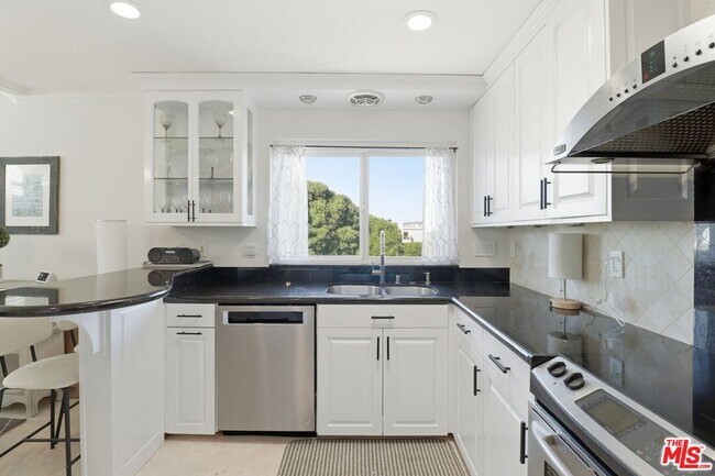 Building Photo - 6400 Pacific Ave