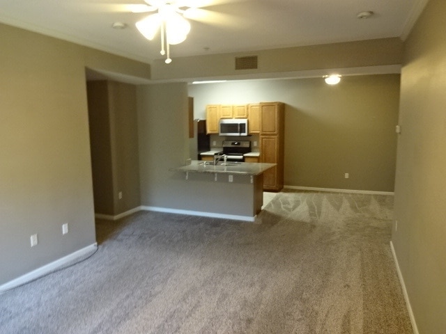 Building Photo - NICE 3 BEDROOM CONDO, 2 BATH, & 2 CAR GARA...