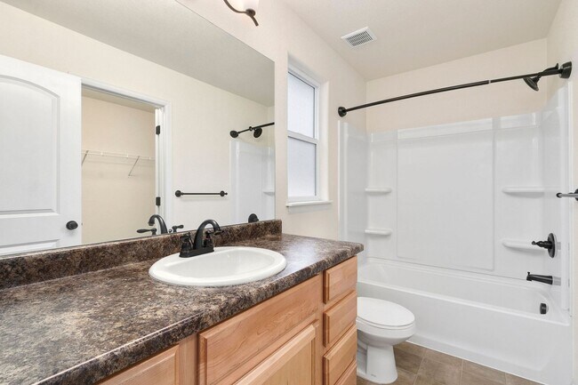 Building Photo - RainDance Resort-Style Living with 5 Bedroom, 3 Bathroom Ranch Home!