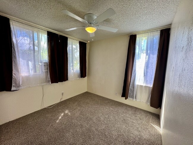 Ceiling fan and window AC unit added to second bedroom. - 95-644 Hamumu St