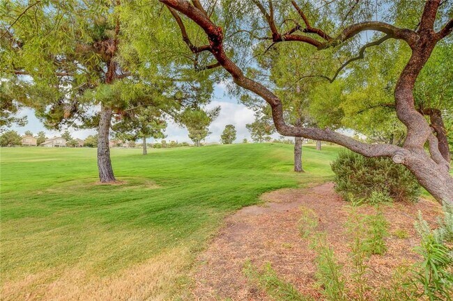 Building Photo - Amazing condominium in gated upscale neigh...