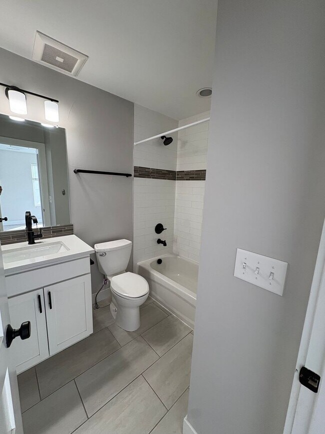 Building Photo - Modern 2 Bed + Flex Townhome with Rooftop Deck Near Paco Sanchez Park & Light Rail