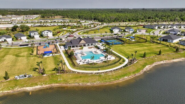 Building Photo - Luxurious Living: Spacious 5-Bedroom Home with Scenic Views in Port Saint Lucie!