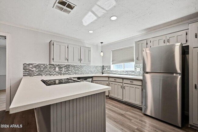 Building Photo - 6133 W Tierra Buena Ln