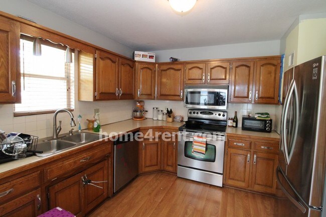 Building Photo - SS Appliances Fenced Yard Finished Basement