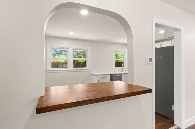 Building Photo - Spacious Split-Level Living with Dual Fireplaces & Expansive Deck