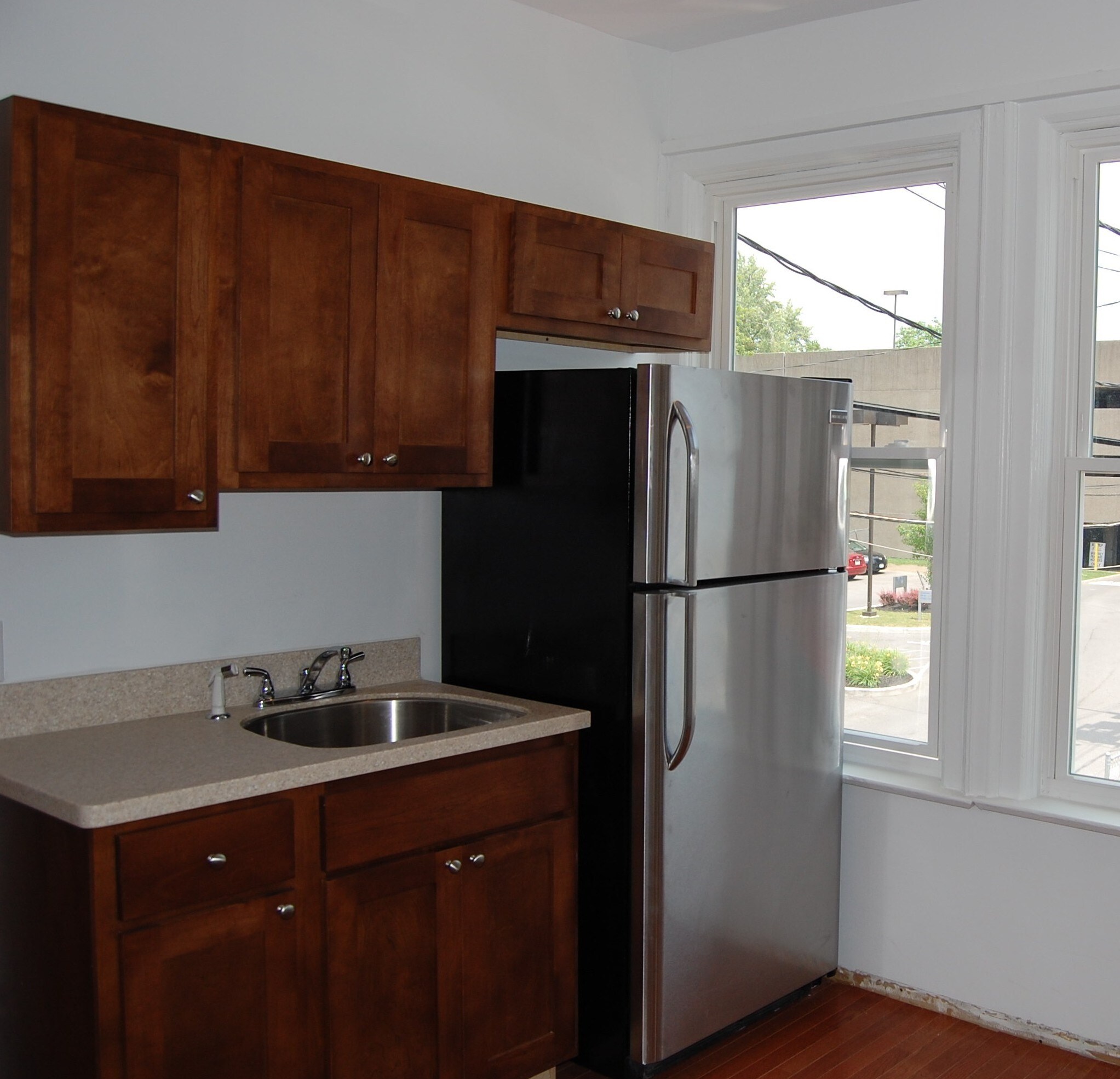 Kitchen with Corian countertops - 485 Elmwood Ave