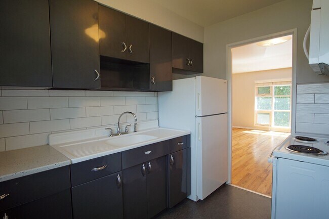 Building Photo - Fabulous Mid-Century Renovated 2Bdr w/Hardwoods, Dishwasher + Pets OK
