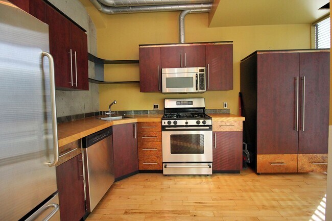 Building Photo - Stylish and Sleek Loft at the Mosaic in Do...