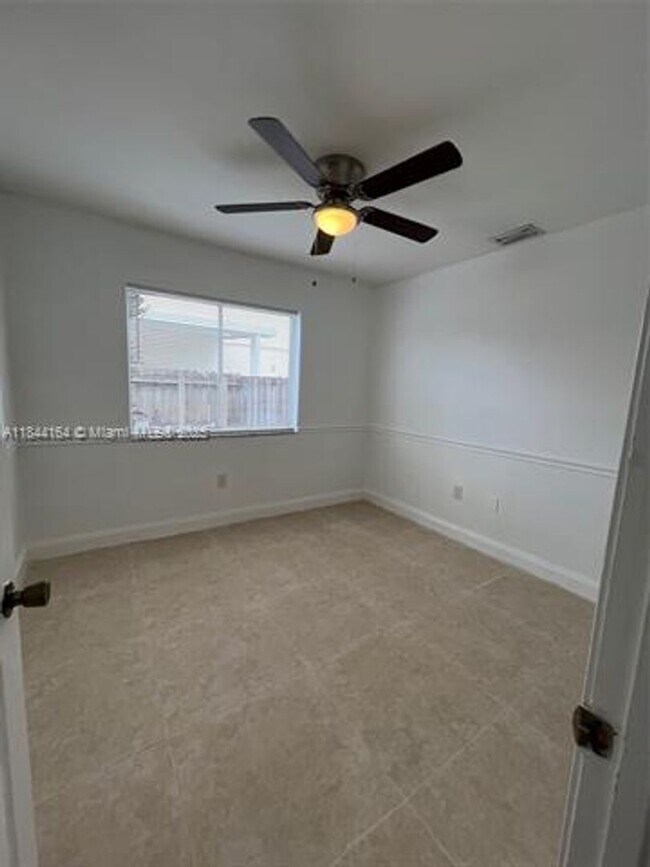 Building Photo - 10511 SW 145th Ct