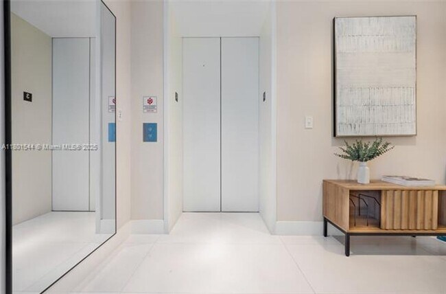 Building Photo - 10201 Collins Ave