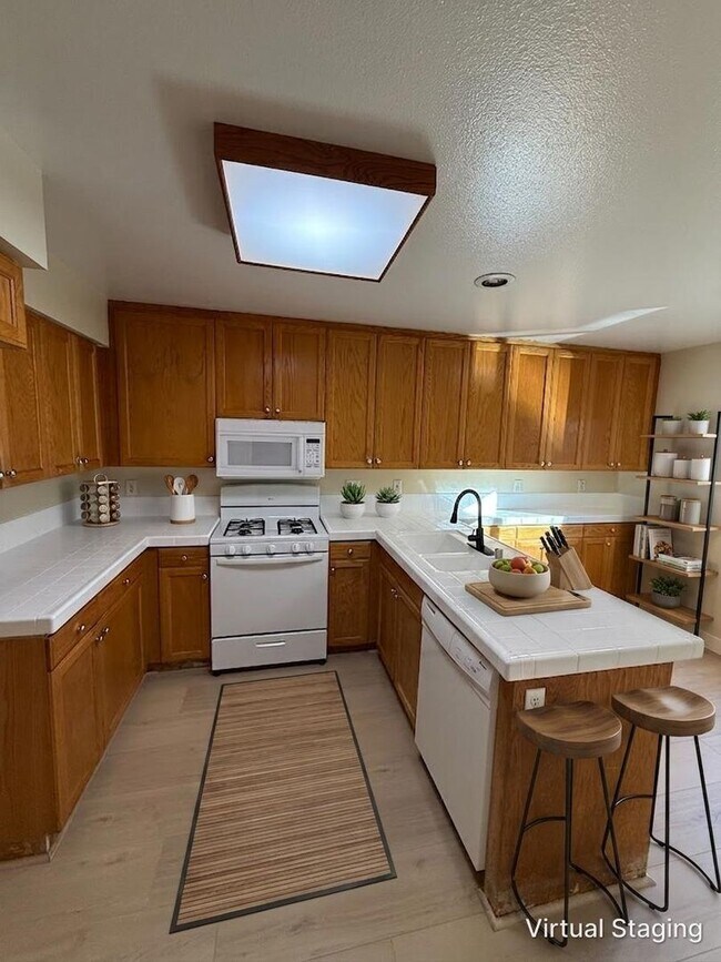 Building Photo - Beautiful 3 Bedroom 2 1/2 Bathroom Granada Hills Townhouse! Must See! Ready For Move-In!