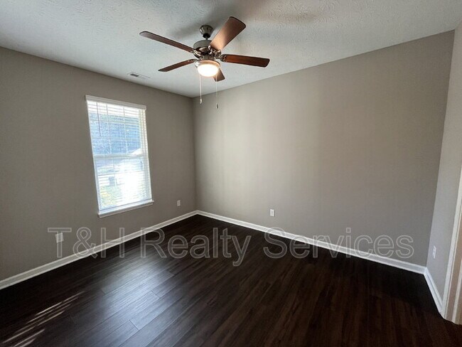 Building Photo - 5642 Brownstone Dr