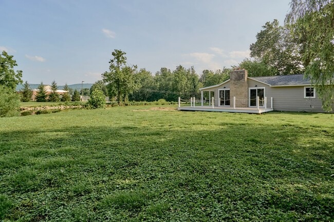 Building Photo - Creekside Charm: Your Dream, 1 of a kind, ...
