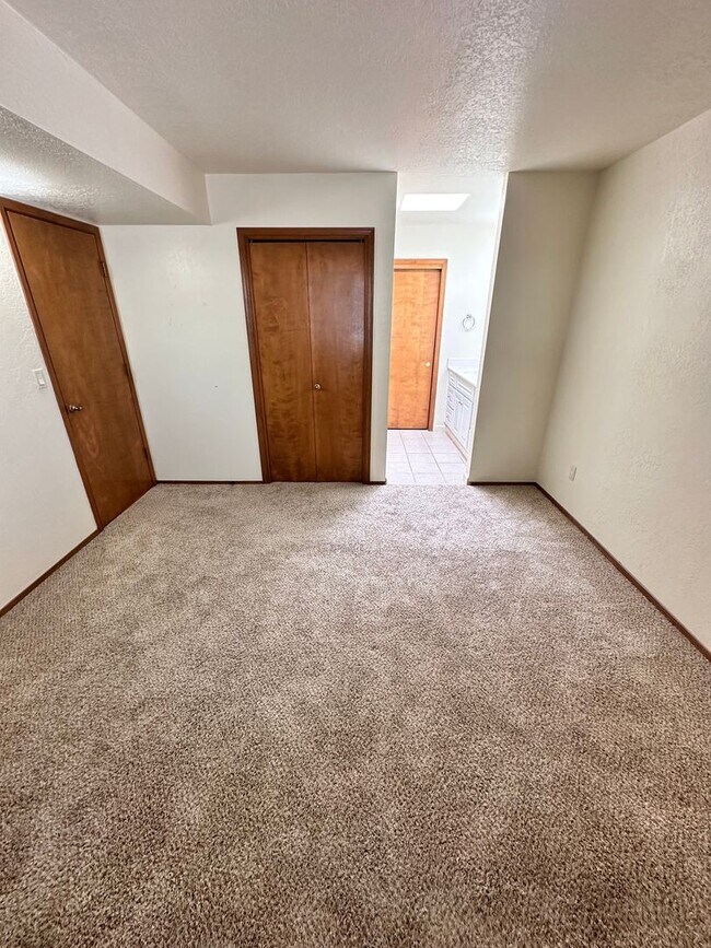 Building Photo - Move in Special! 2 Bedroom 2 Bath Townhome w/2 Car Garage and Refrigerated Air