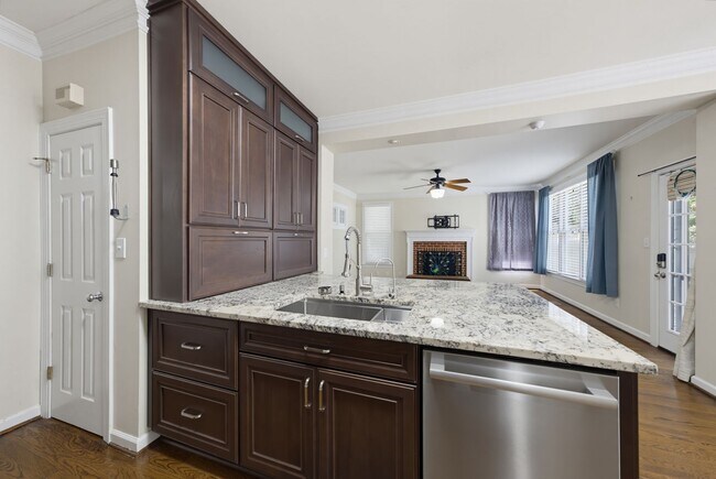 Building Photo - Southern Charm Meets Everyday Entertainment and Convenience!