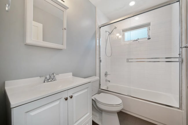 Building Photo - Renovated Duplex unit in the heart of Elmh...