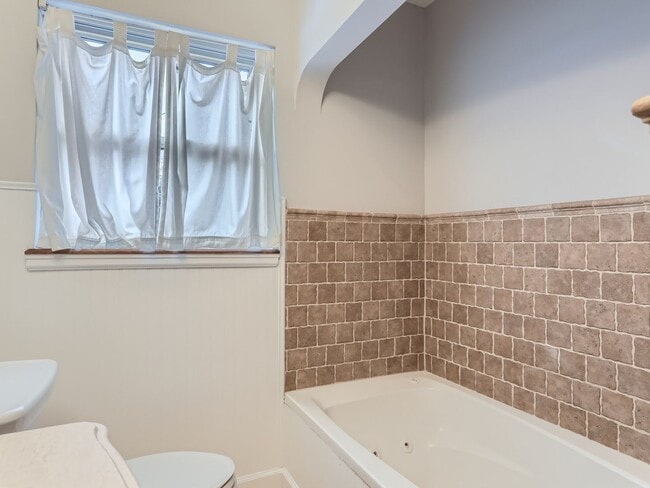 Building Photo - Evolve Real Estate: Available 8/8/26 Brick Tudor with Large Yard and Finished Basement!