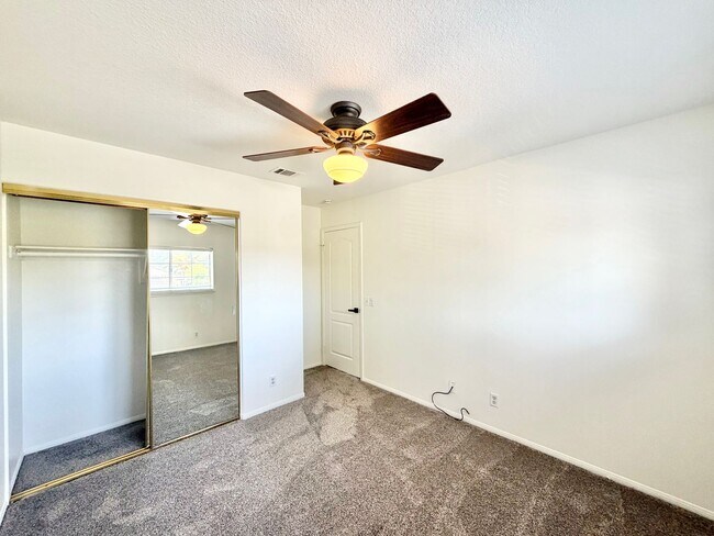 Building Photo - Spacious 5 Bedroom 3 Bathroom Home with Updated Paint, New Roof & Private Balcony