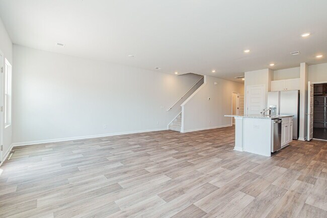Building Photo - Brand-new 3 bedroom, 2.5 Bath Townhome with pond view