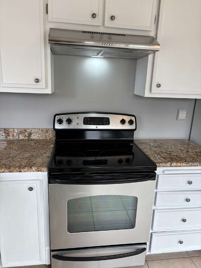 Building Photo - "Charming Concord Retreat: 3-Bedroom Gem with Granite Accents & Cozy Fireplace"