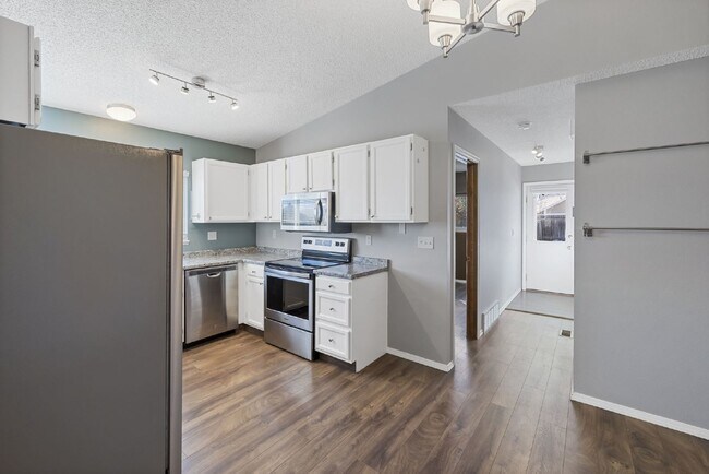 Building Photo - Spacious 4-Bedroom Home with Finished Basement, Large Deck & 2-Car Garage