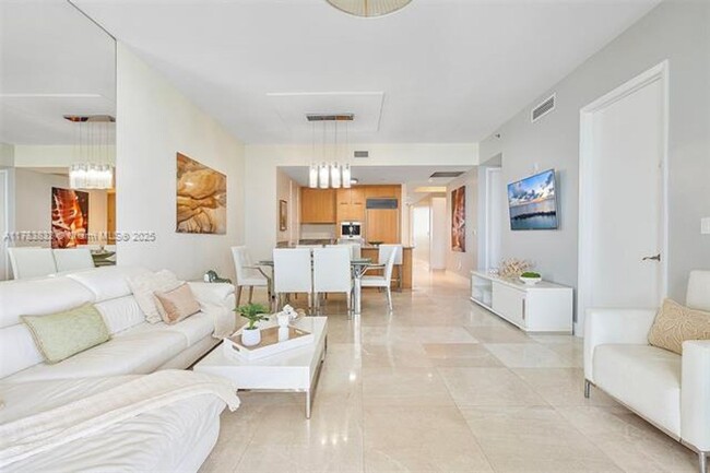 Building Photo - 15811 Collins Ave