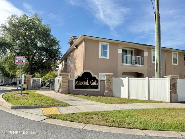 Building Photo - 6788 Manotak Oaks Dr